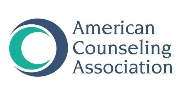 Logo of the American Counseling Association featuring a circular design and text
