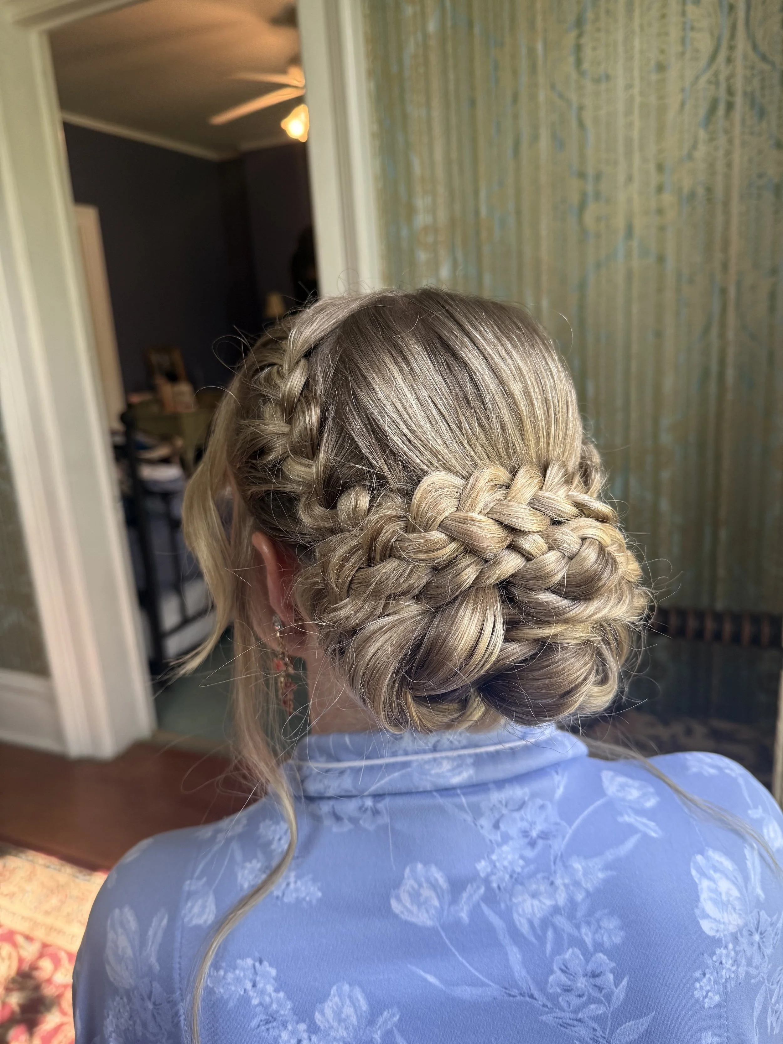 Romantic braided bridal updo with soft texture