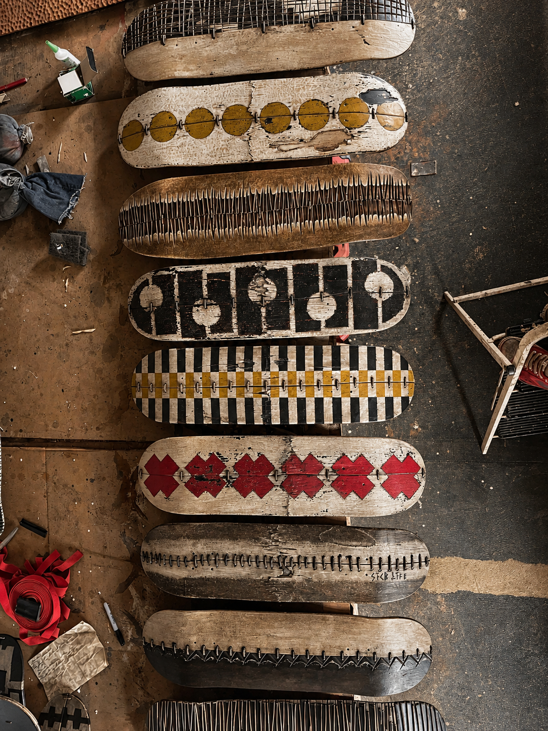 Hand-carved wall sculpture built from salvaged skateboard decks, Circle Factory.