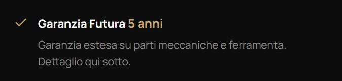 Immagine di un'icona o testo relativo a una garanzia di 5 anni su parti meccaniche e strumenti.