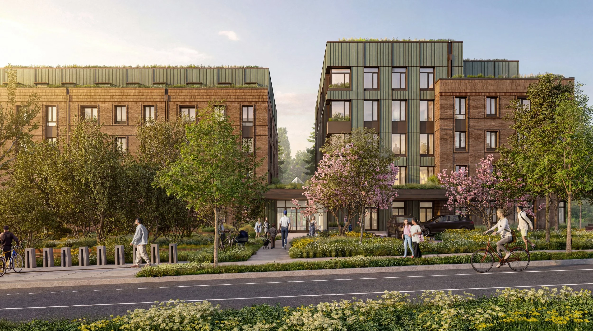 Digital rendering of The Magnolia / Boston residential buildings with green rooftops, surrounded by flowering trees, walking paths, and people biking, walking, and socializing in the park area.