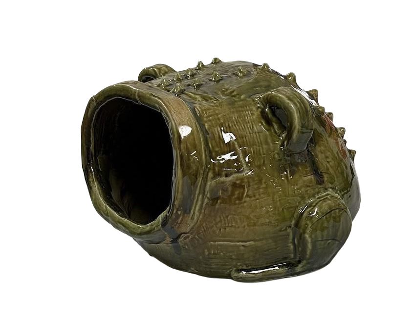 Image of Igbo-inspired frog, left-facing.