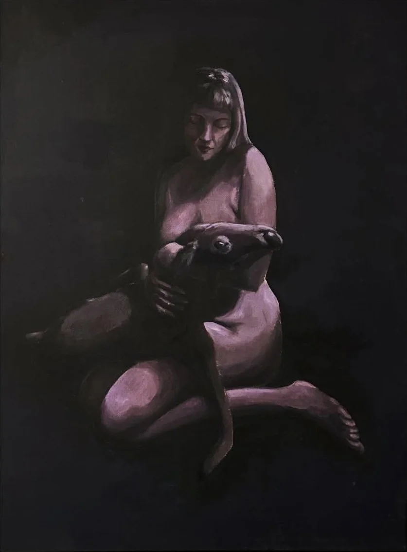 A painting of a woman sitting with her legs folded, holding a deceased deer, against a dark background. The woman and deer are cast in a purple hue and is looking down.