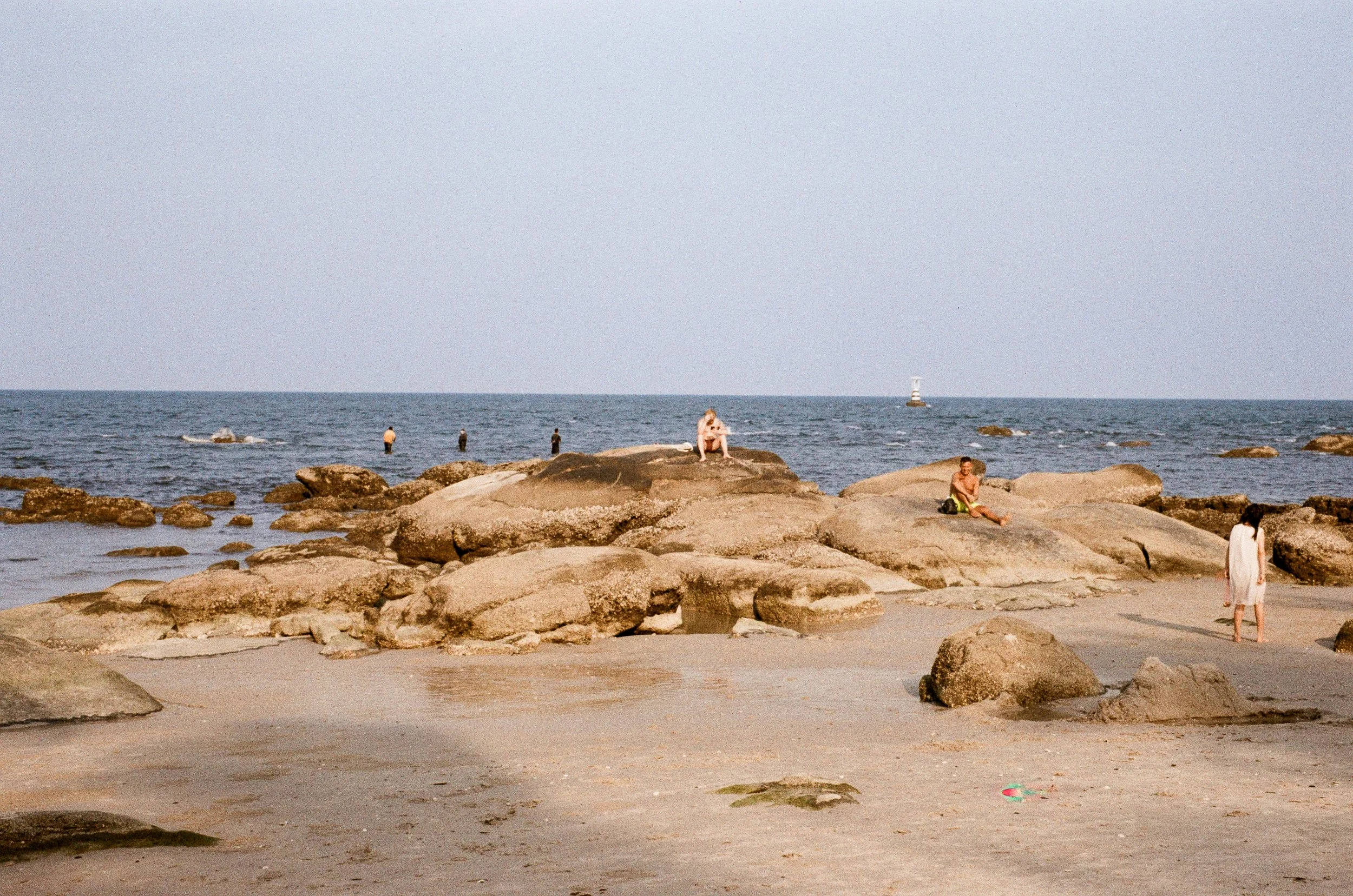 coast of Hua Hin, Thailand, people taking a break on the beach