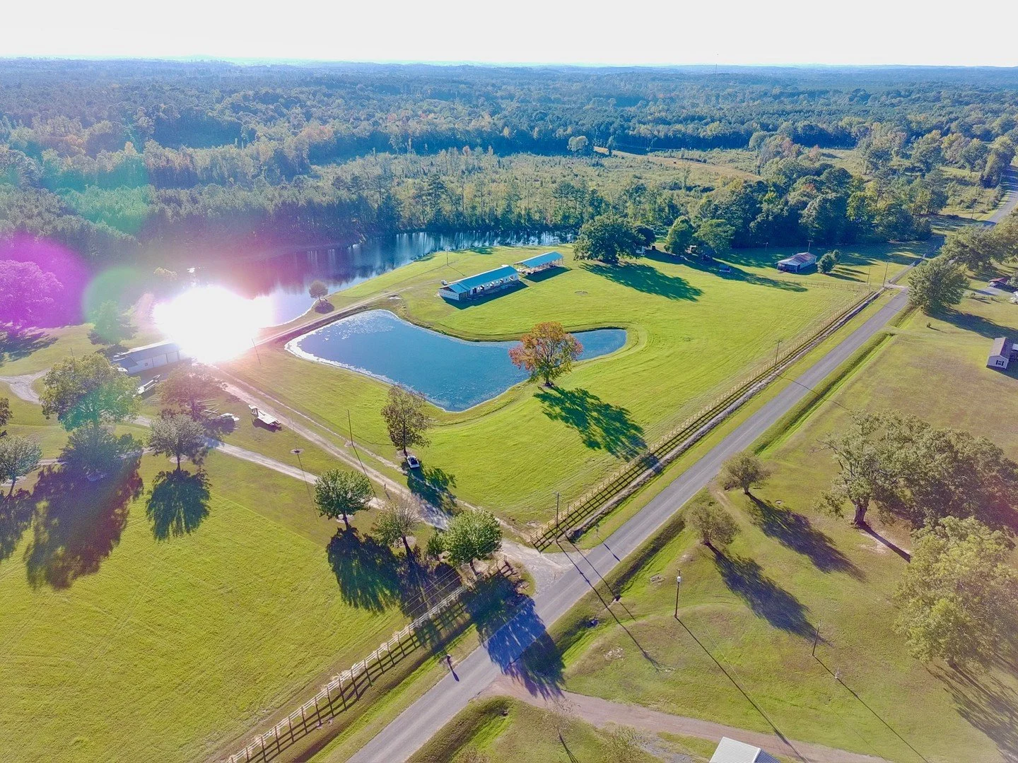 From above, you really get it. Both ponds catching the light, the pasture rolling out further than it looks from the ground, the barn tucked back where all the work is happening right now.

This is the kind of view that puts the scale of this place i