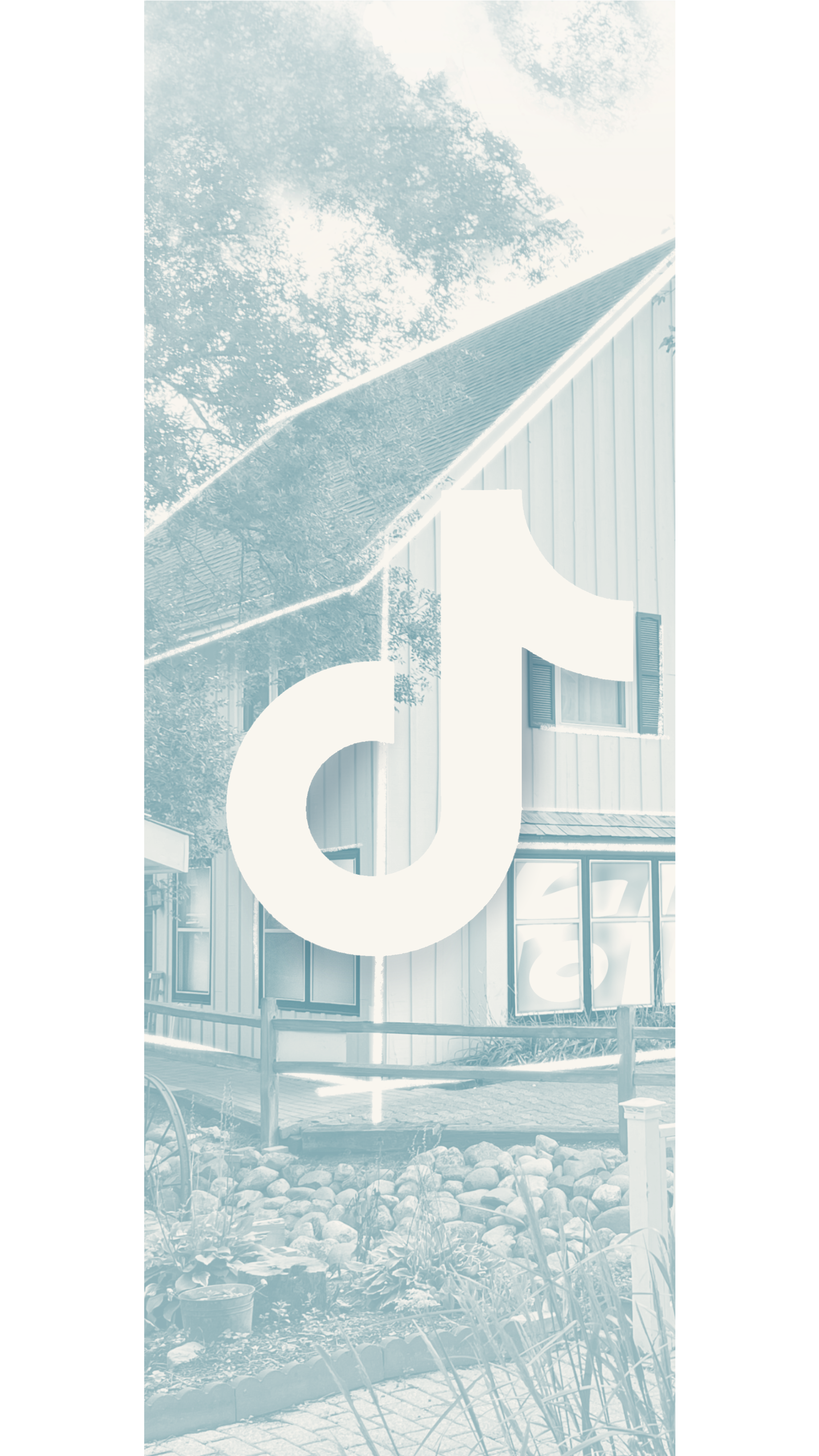 A large TikTok logo sign in front of a building with windows and a wooden exterior, with trees and a landscaped garden in the background.