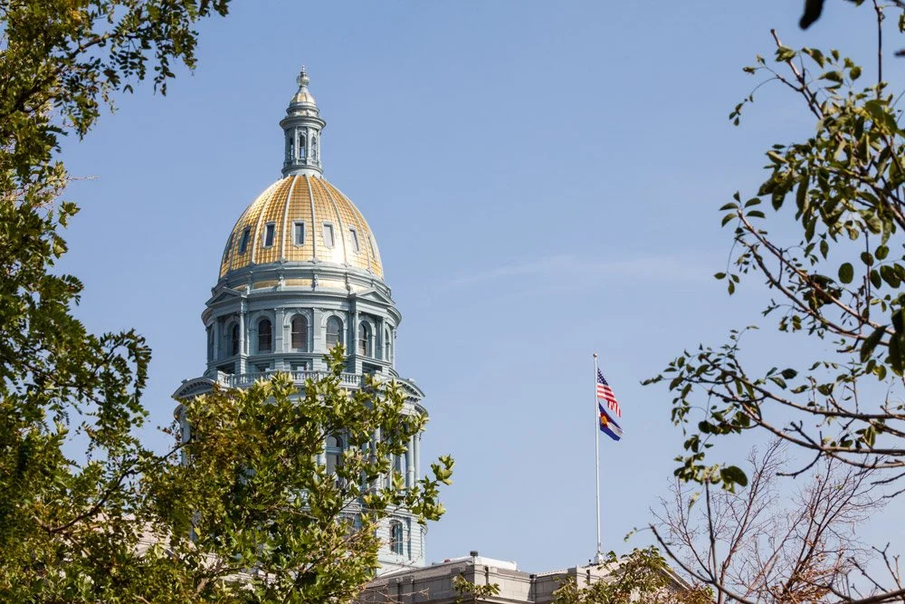 The Colorado State Capitol building with a gold dome to highlight the advocacy of the Colorado Children's Alliance.