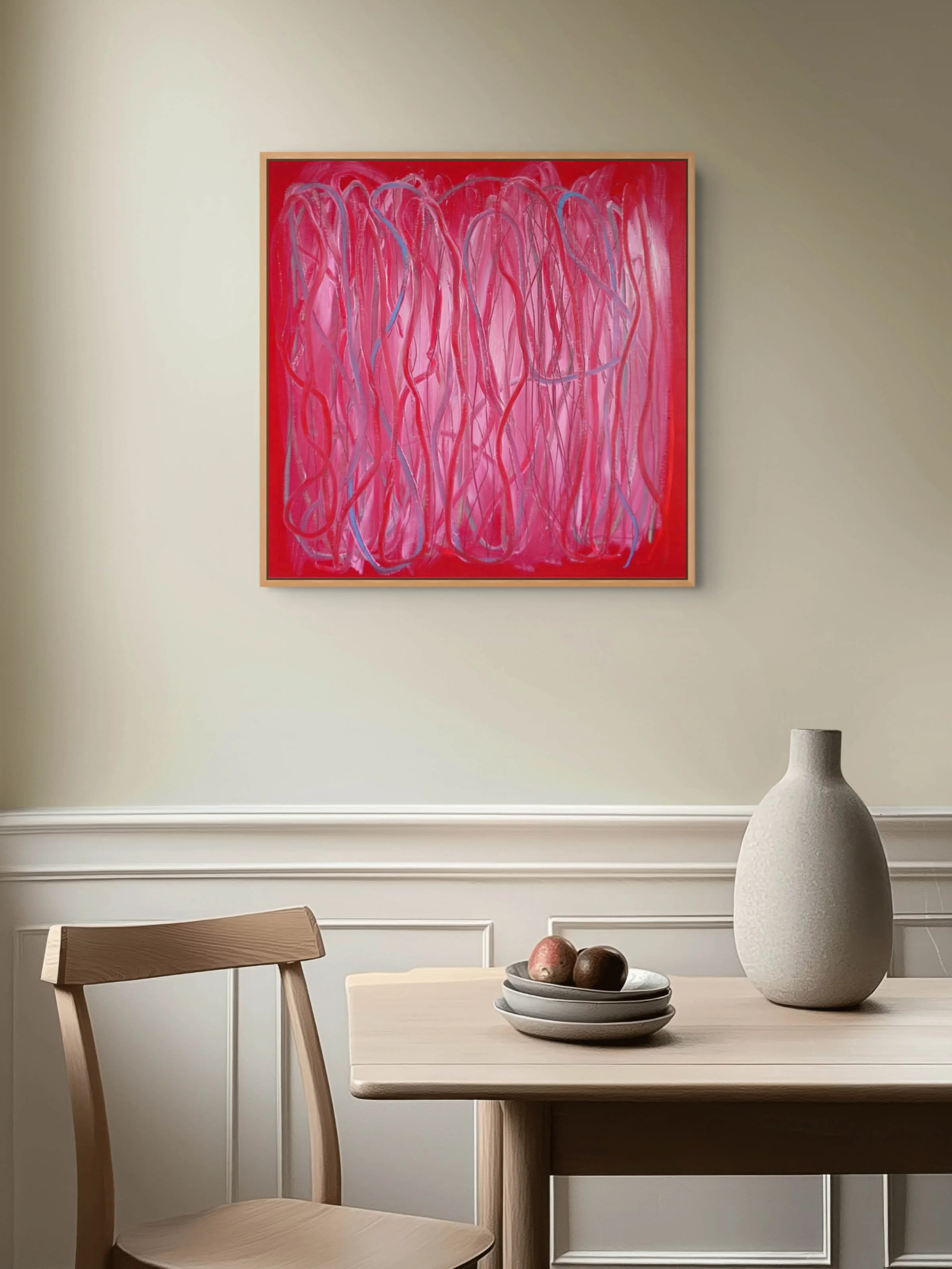 Room view of Softly Forgiven 60x60cm by Gedi Campbell. Red abstract painting with lines of oil sticks and graphite lines.