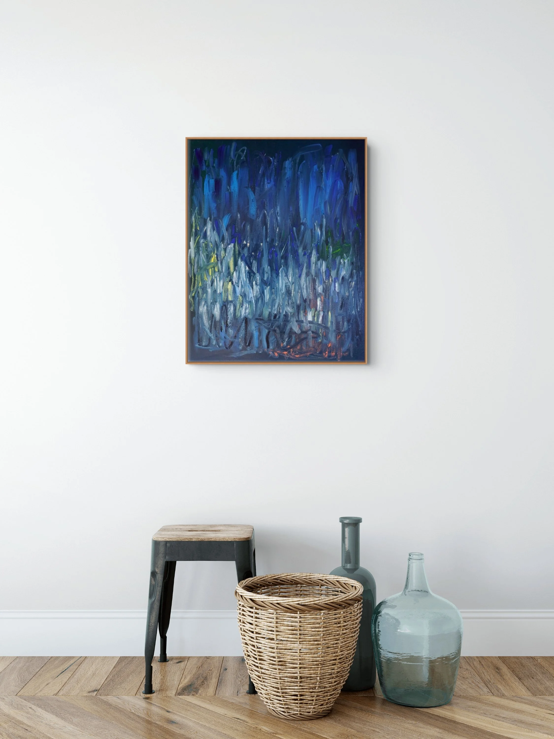 Room view of oil paint and oil stick abstract painting. Features bold, sweeping directional gestures dominated by dark blue, whites and blue colours in oil paint with pops of lemon yellow and orange coloured oil sticks.
