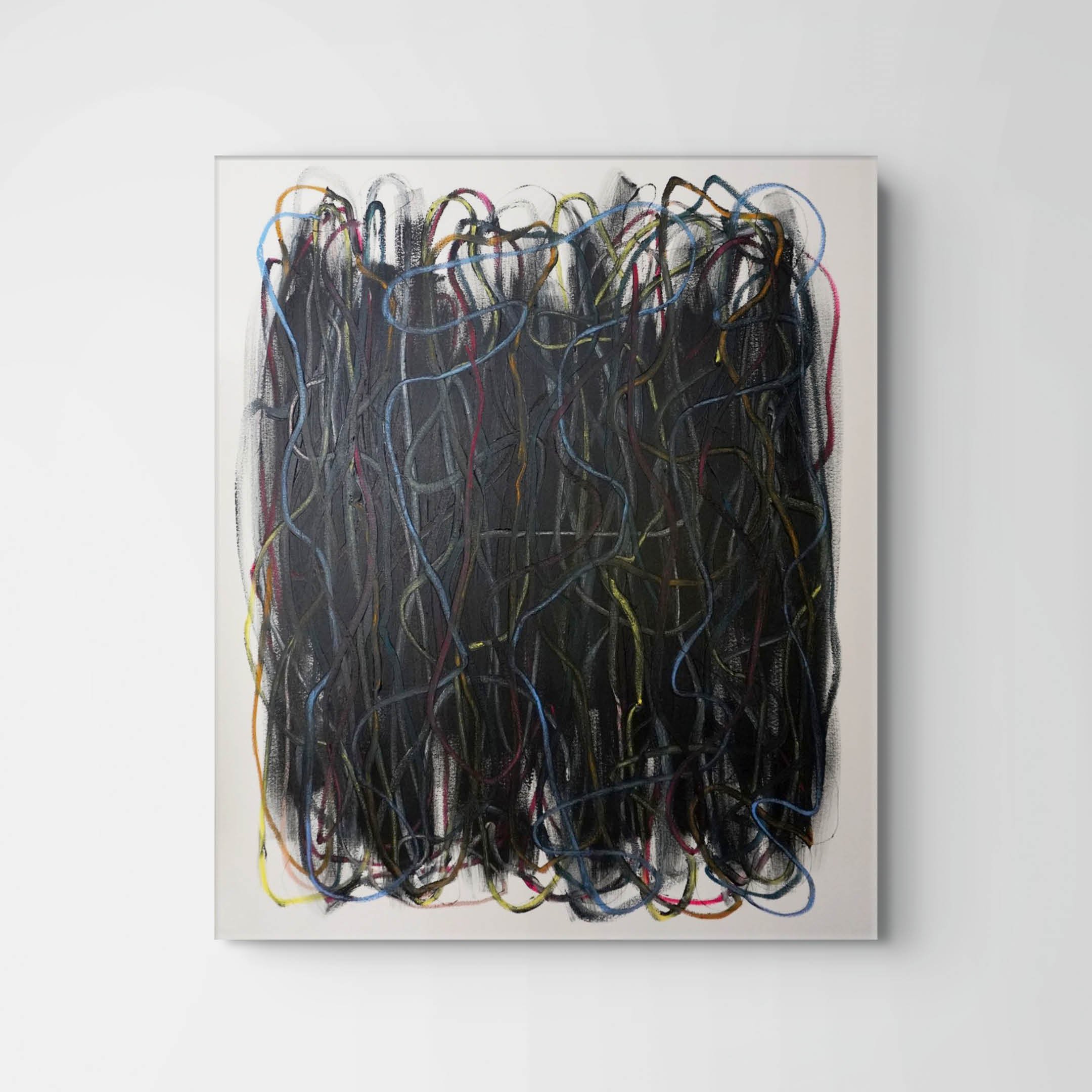 Abstract artwork featuring tangled, colorful lines on a dark background, framed and hung on a white wall.