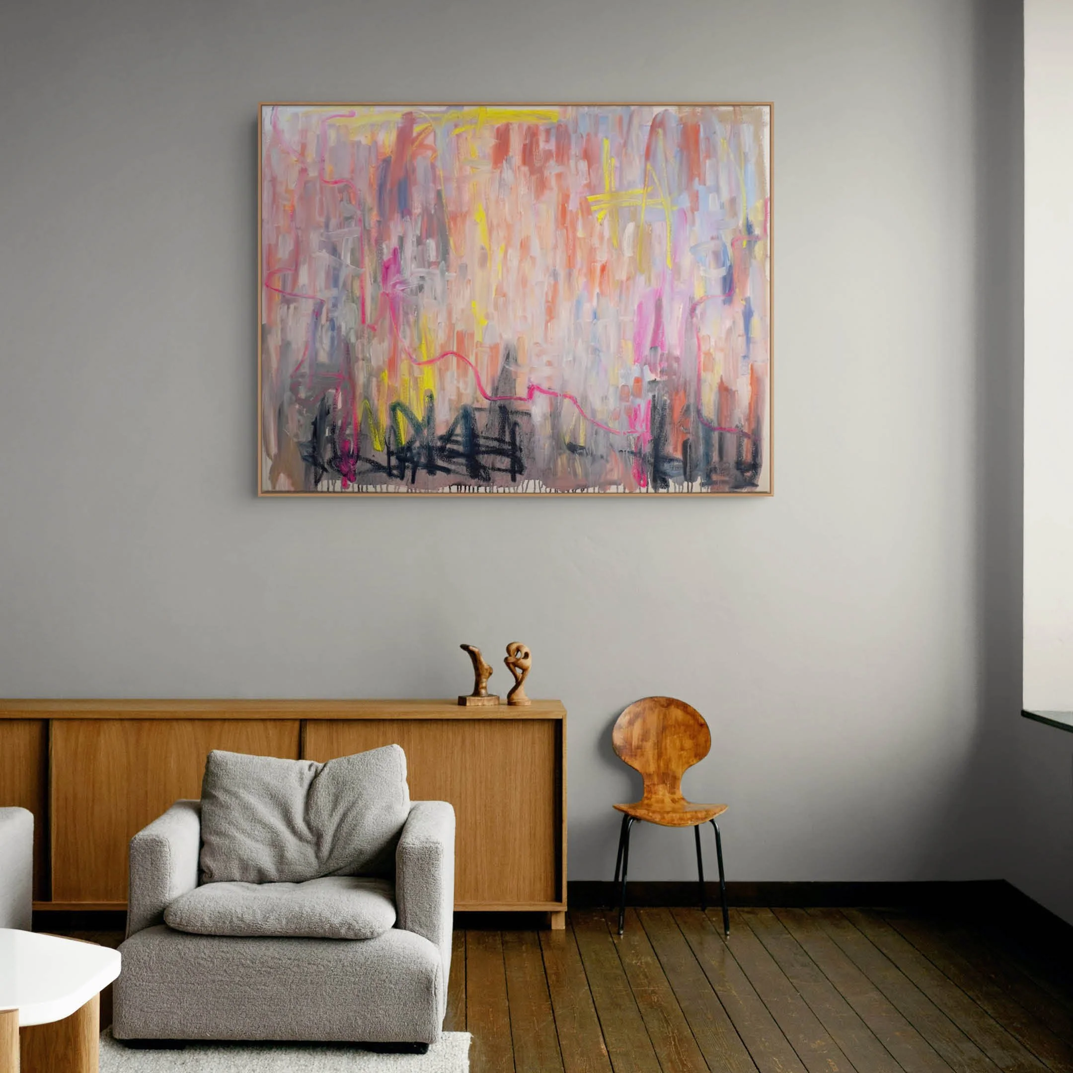Room view of large-scale oil paint and oil stick abstract painting. Features bold, sweeping directional gestures dominated by pale orange, pink, greys, blues in oil paint with pops fluorescent yellow and pink coloured oil sticks.
