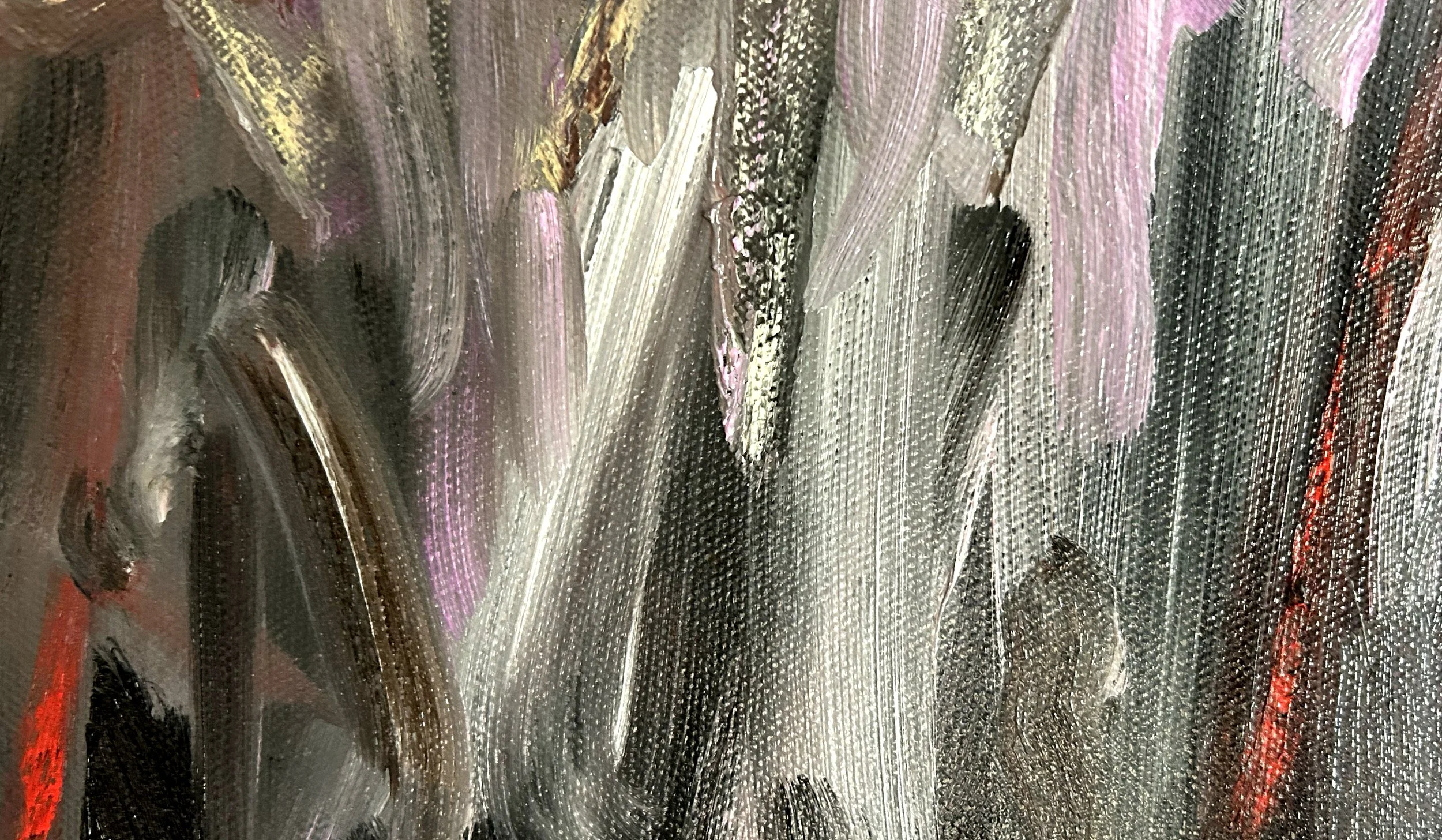 Close up of oil paint and oil stick abstract painting. Features bold, sweeping directional gestures dominated by dark black and grey background with, whites and lilac colours in oil paint with pops of red and purple coloured oil sticks.