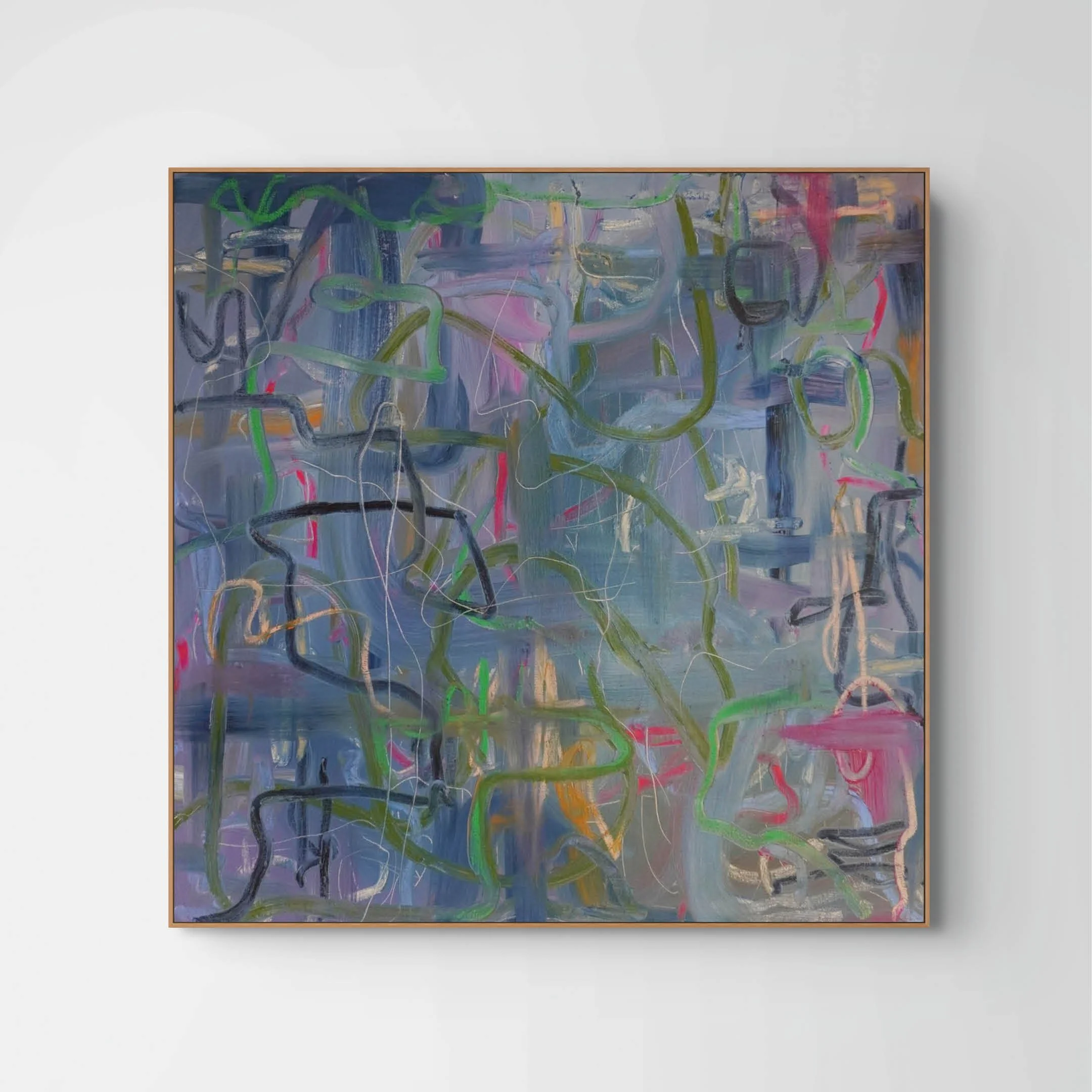 An abstract painting with streaks of various colors including green, pink, purple, orange, and gray displayed in a wooden frame on a white wall.