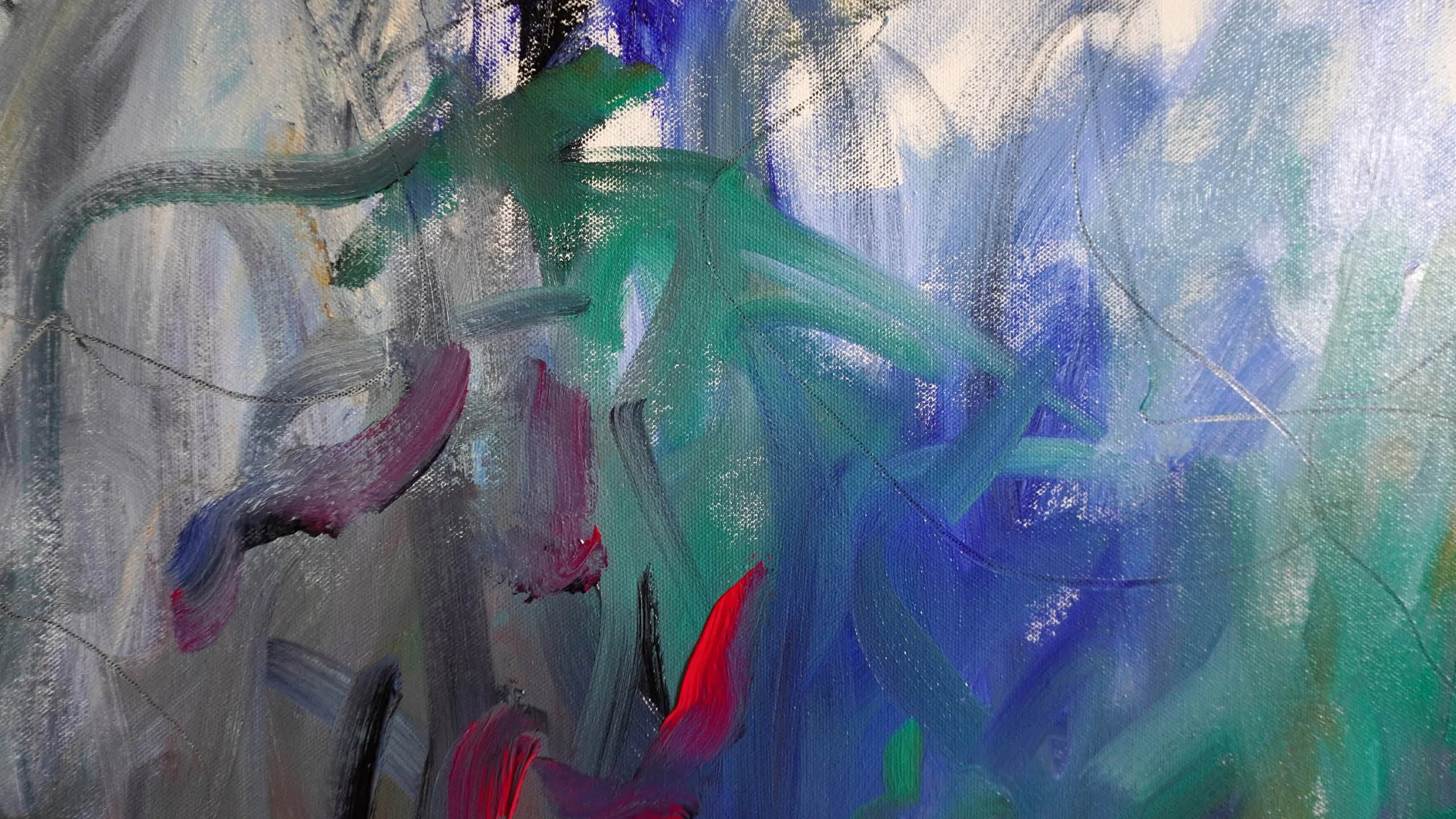 Close up of large scale abstract painting features bold, sweeping directional gestures dominated by green and blue colours in oil paint with pops of red and magenta coloured oil sticks and graphite lines.