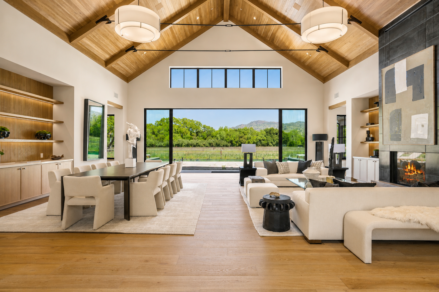 Great room at Trubody Ranch in Napa Valley featuring vaulted wood ceilings, expansive glazing, landscape views, and a contemporary open living and dining arrangement.