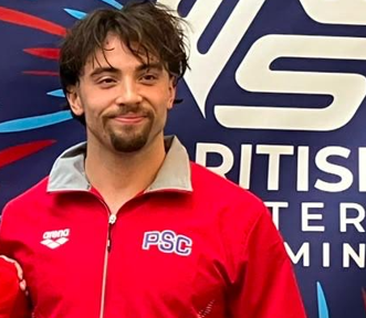 JP Swim Academy swimming instructor wearing Preston Swimming Club kit.