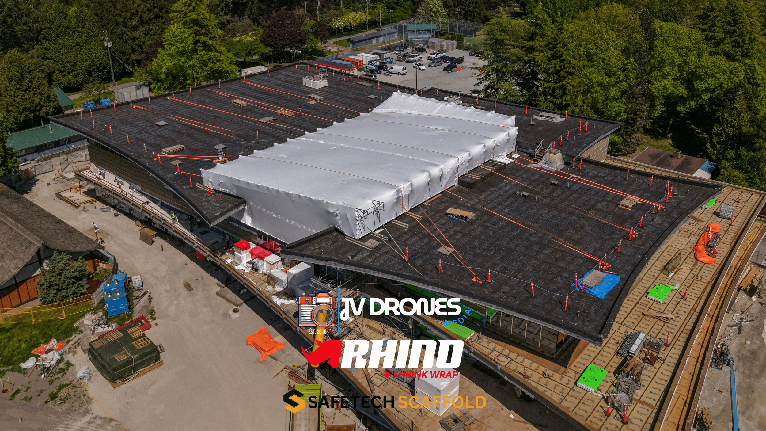 Aerial drone photo of commercial scaffold and shrink wrap containment project in Vancouver, BC