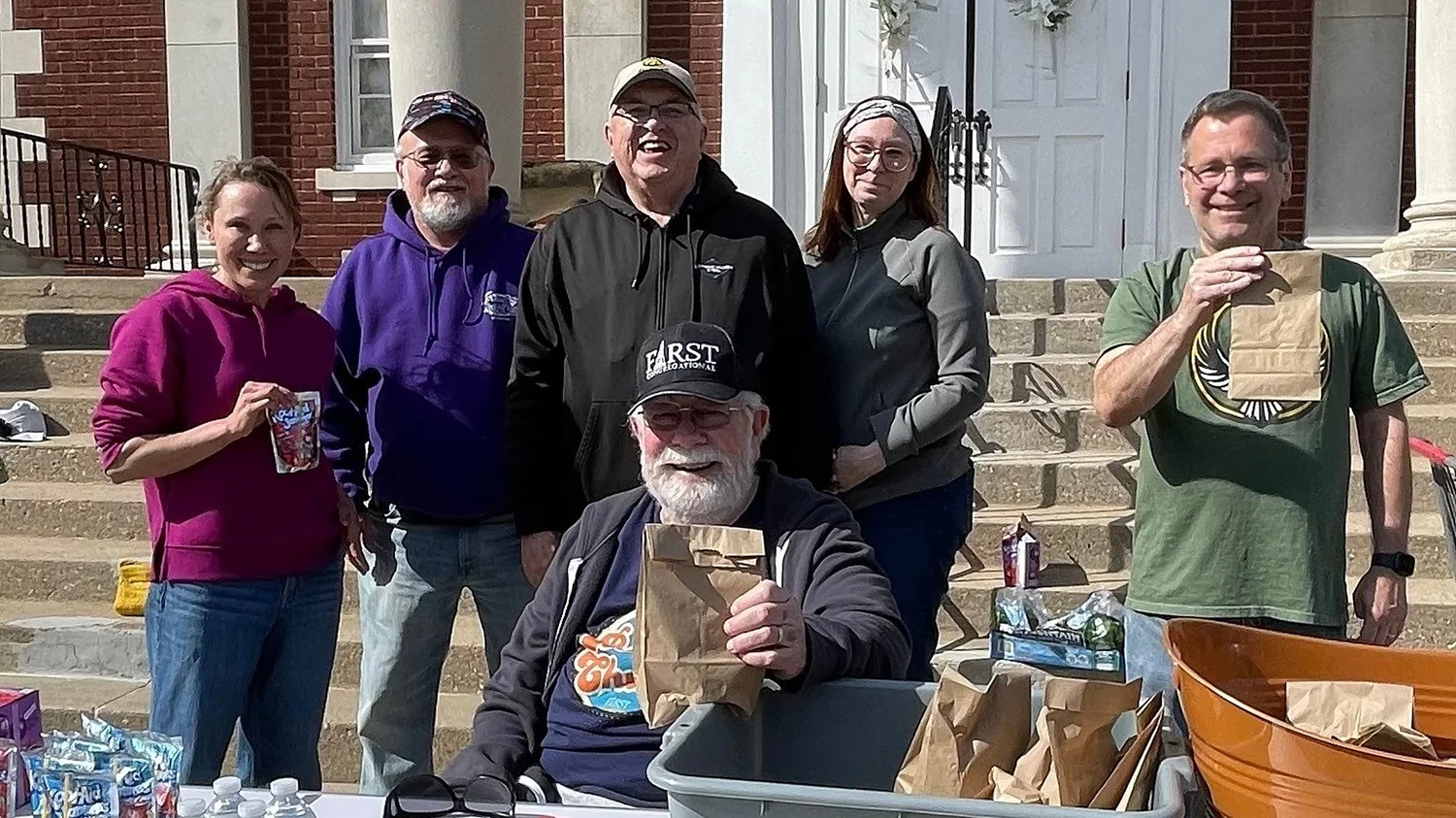 Volunteers handing out Monday Munchies