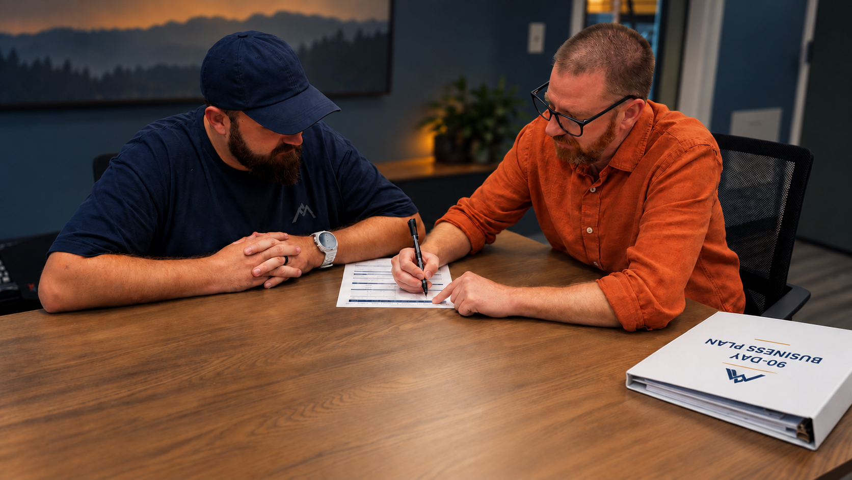 Home service business owners reviewing business plans and discussing growth strategies