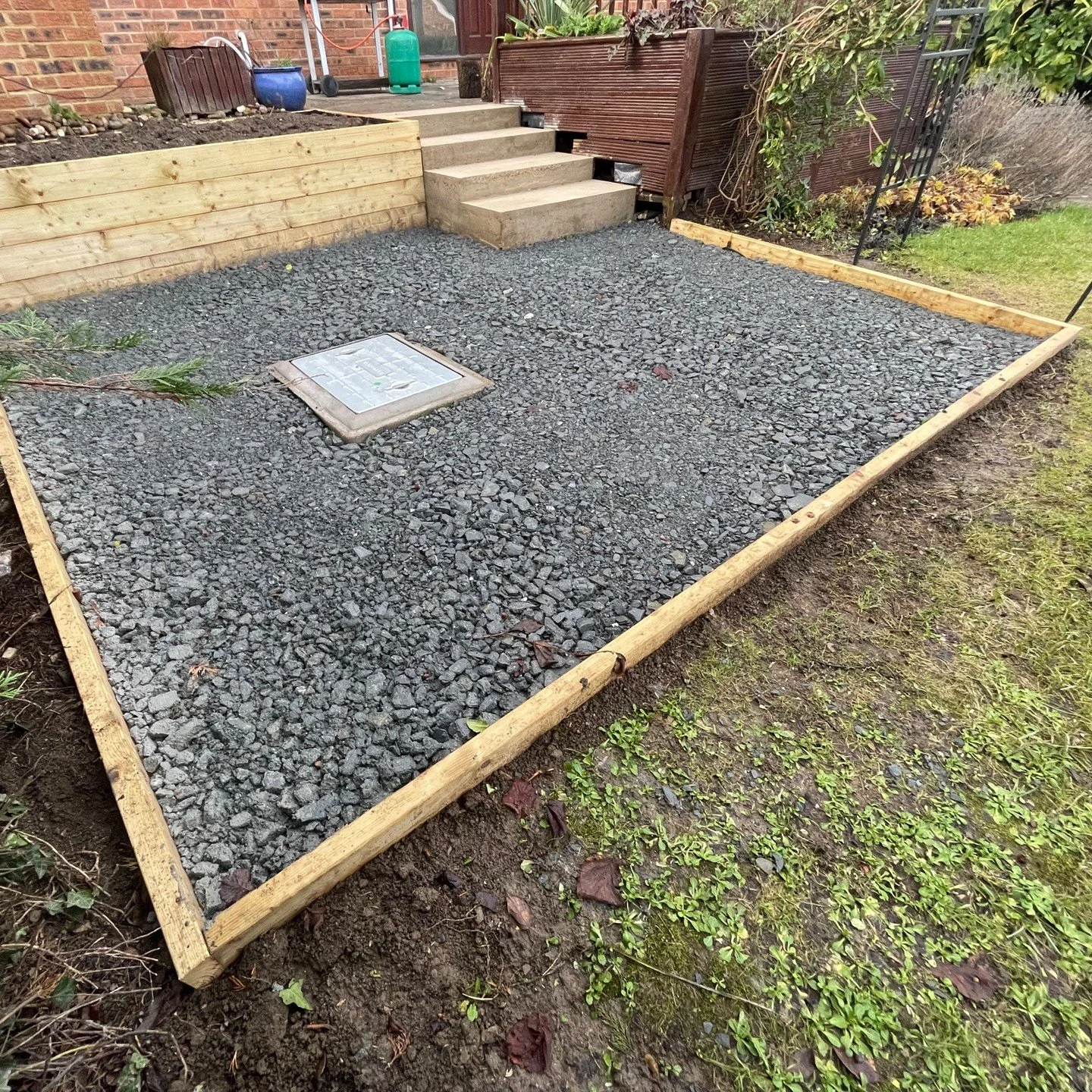 Rotting timber steps and decking needed replacing with a fresh approach.

With a tight budget and a hands-on client, the old deck was removed ahead of work to reduce costs. A concrete slope underneath meant working with what was already there rather 