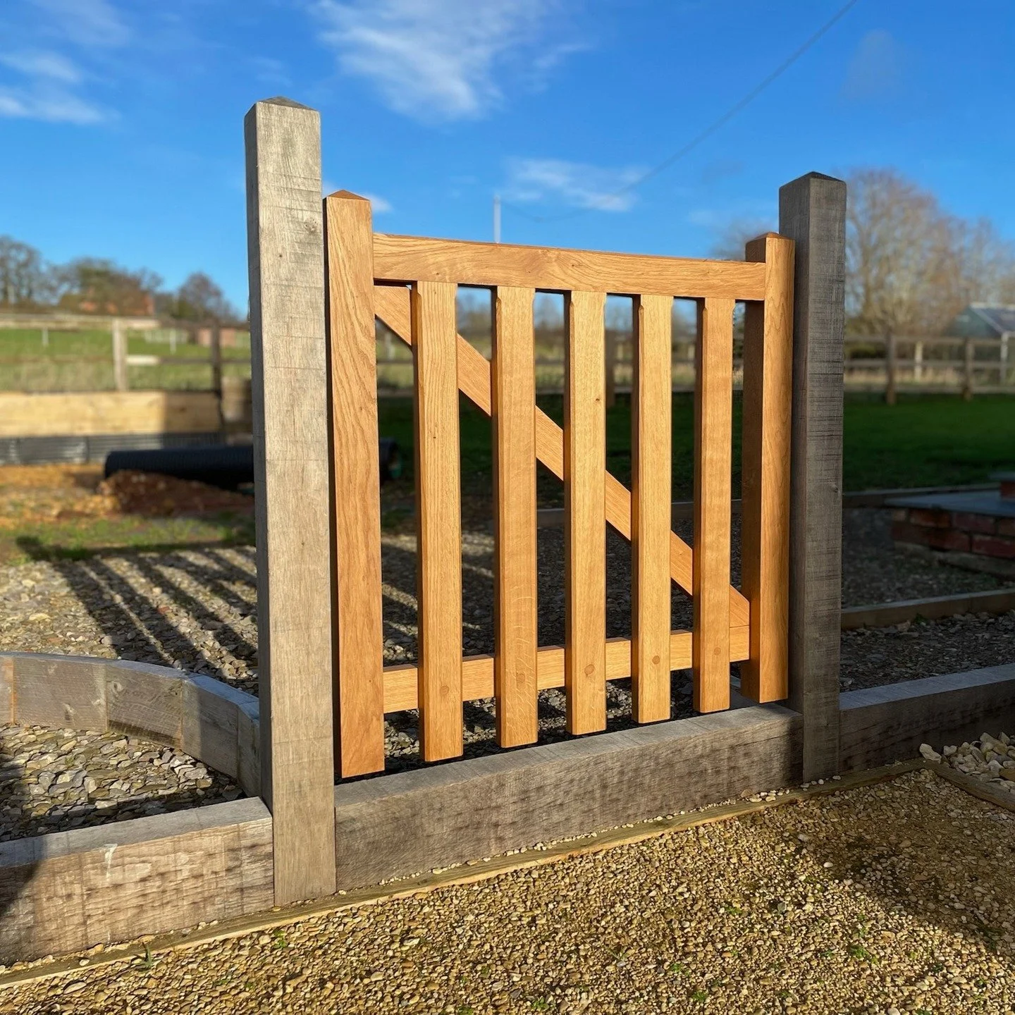 Designed, crafted and installed a solid oak picket gate with oak posts.

Finished in Osmo 701; a natural oil finish without UV protection. This finish allows the oak to silver whilst providing protection from the elements.

For this build, I also sup