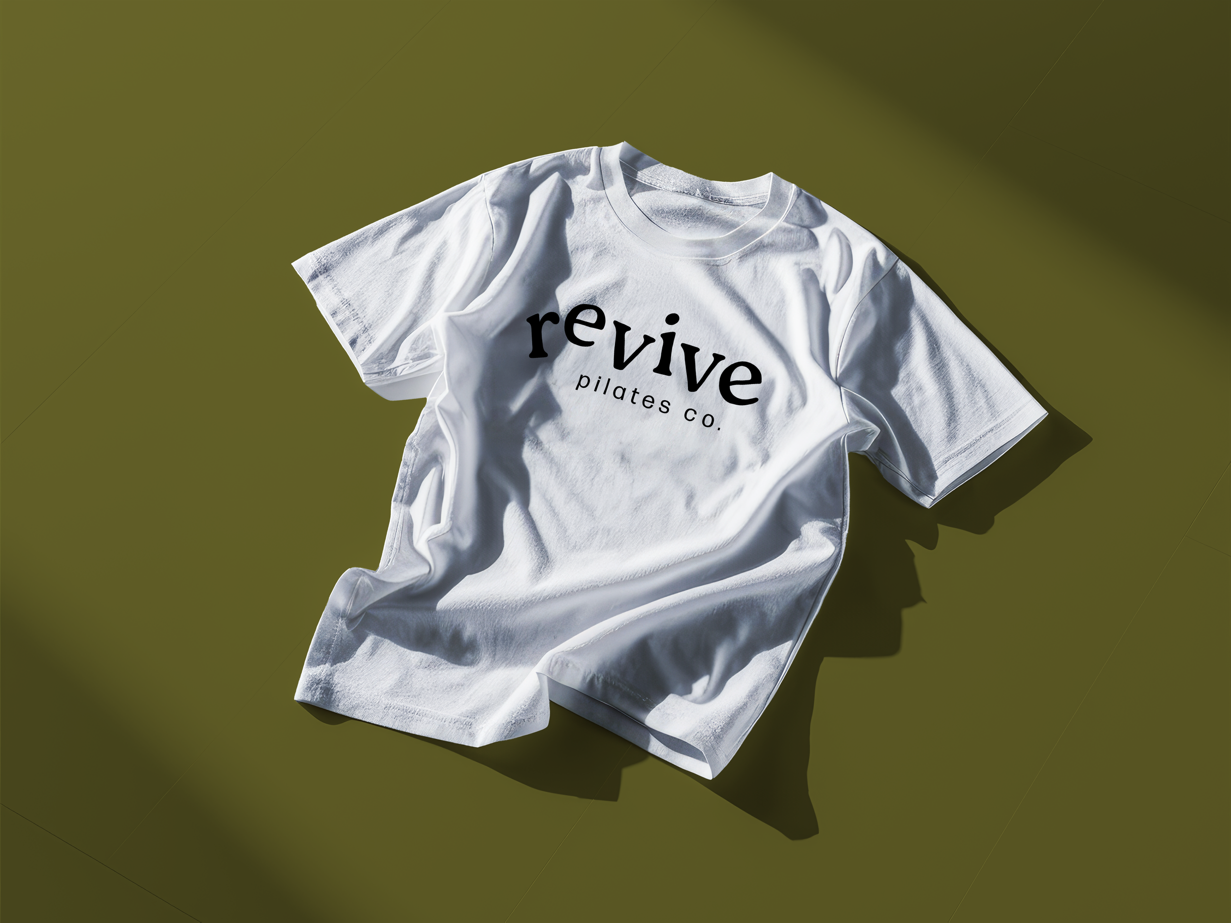 T- Shirt on the floor mockup.png