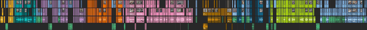 A computer screen displays a digital audio workstation with a colorful arrangement of audio tracks and waveforms.