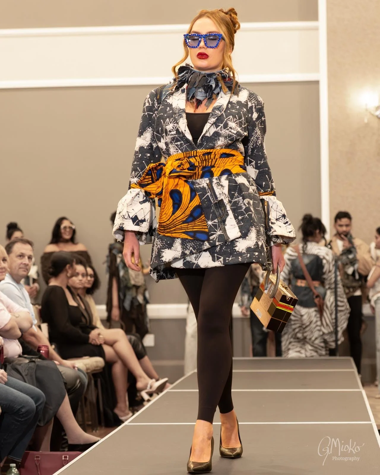 Model wearing the Raw Pearlz ZAHARA black and white textured statement jacket