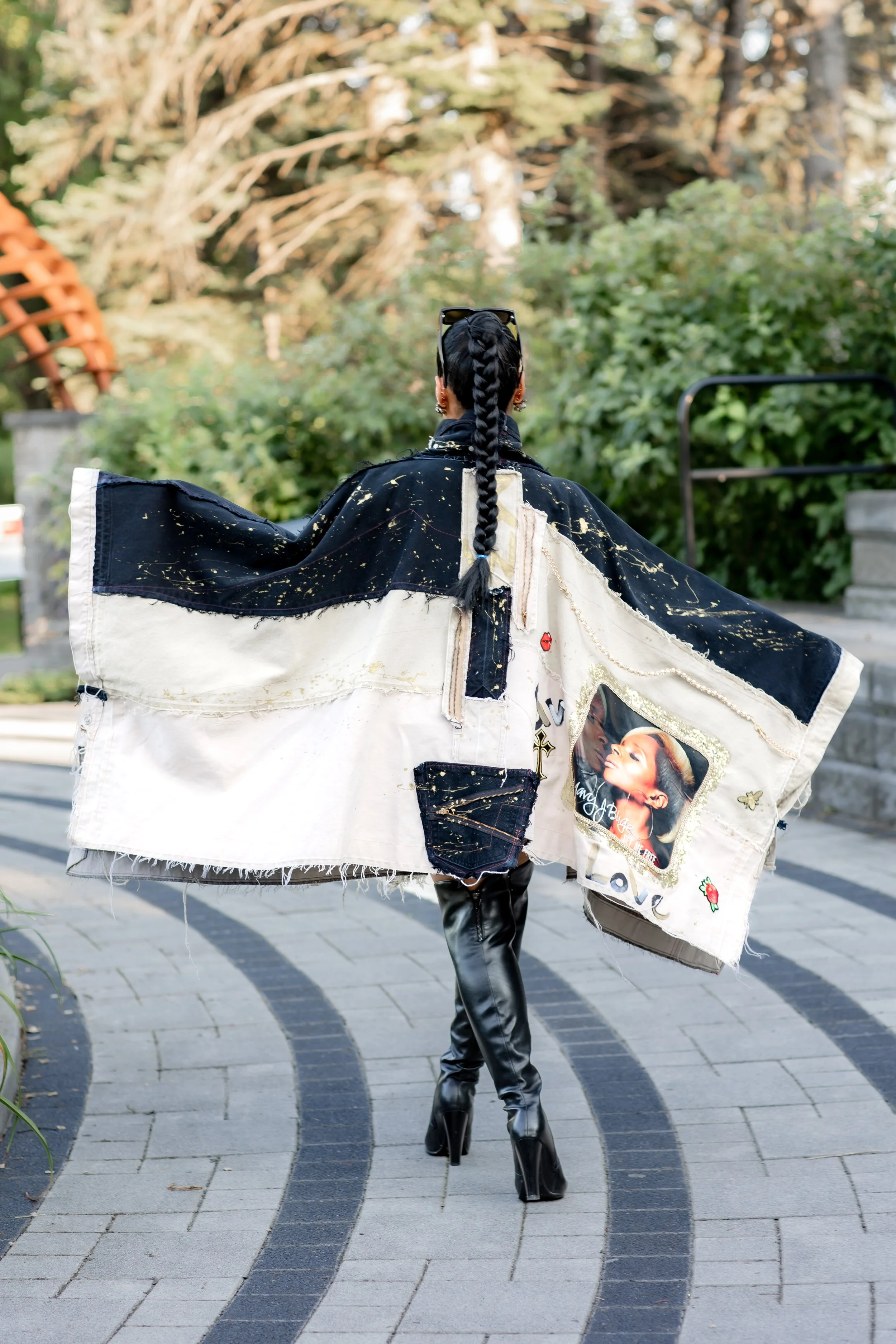 Model wearing the Raw Pearlz NOVA black, white and denim statement jacket