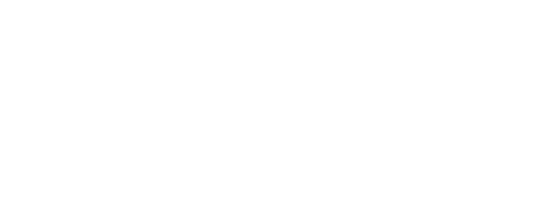White handwriting signature on black background.