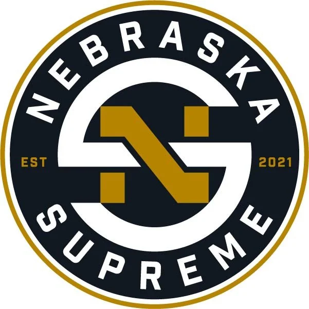 Nebraska Supreme Basketball circular black-and-gold logo.
