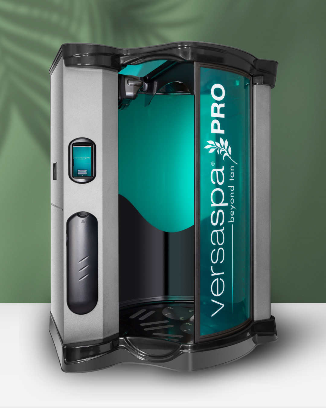 VapoPro beyond tan vaporizer machine with digital screen and circular base, against a green wall with plant shadow.