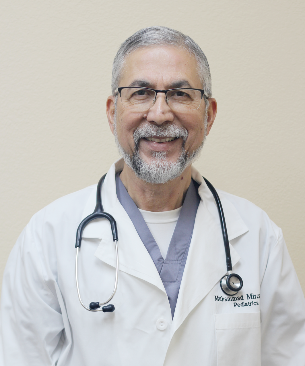 Professional headshot of Dr. Muhammad Mirza at Carrollton Pediatrics
