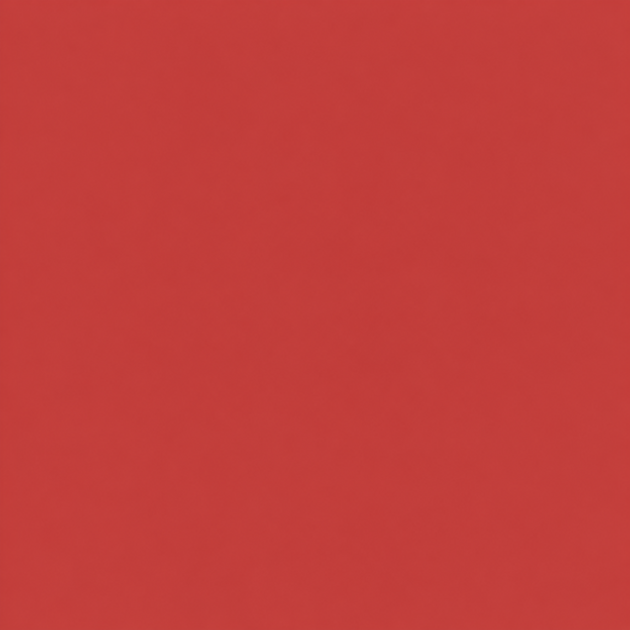 A blurred close-up of a red object or surface