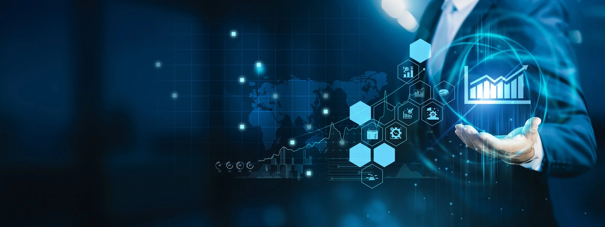 A person in a suit holding a digital holographic display with graphs, charts, hexagons, and a world map background, representing data analysis and global business insights.