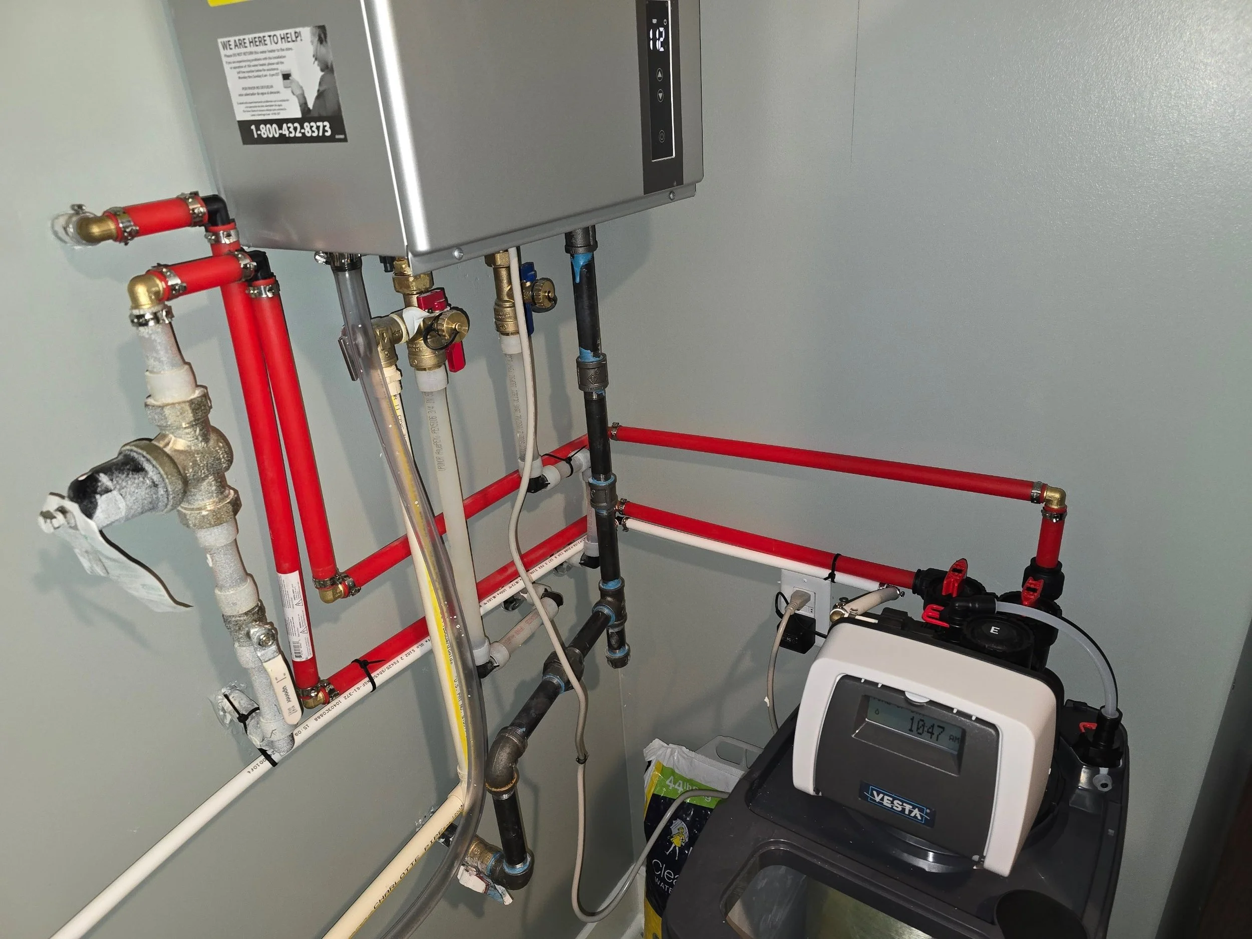 VESTA whole-home water filter installed in a residential utility space