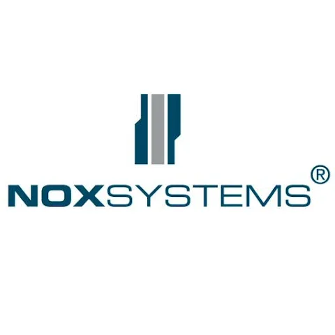 Logo med teksten "NOX SYSTEMS" og et grafisk symbol over.