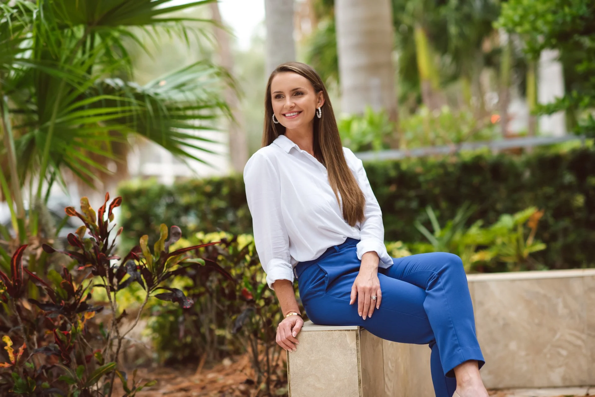 Dr. Nicole Biondoletti, a licensed psychologist, smiling outdoors in Tampa Bay, Florida