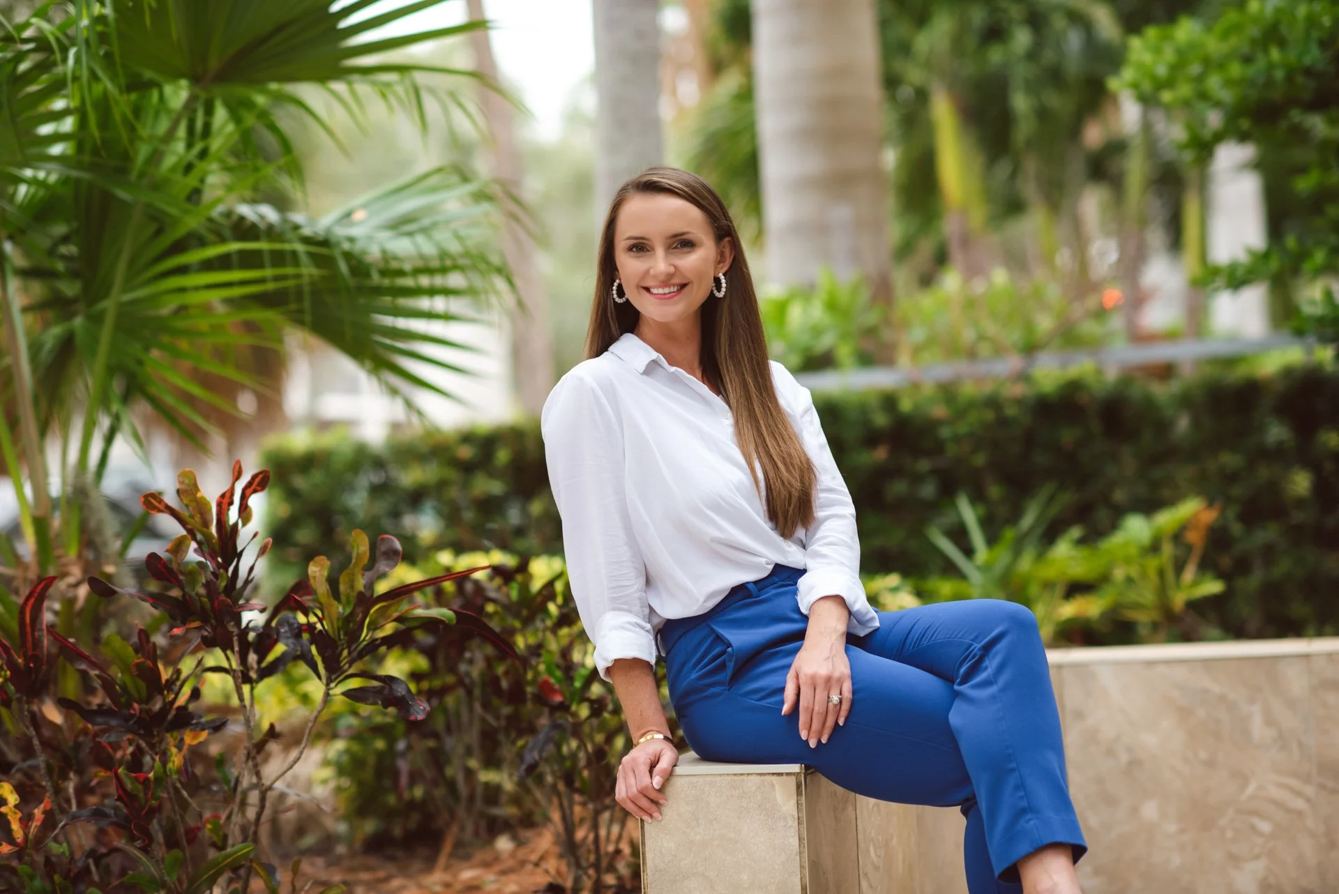 Dr. Nicole Biondoletti, a licensed psychologist, smiling outdoors in Tampa Bay, Florida