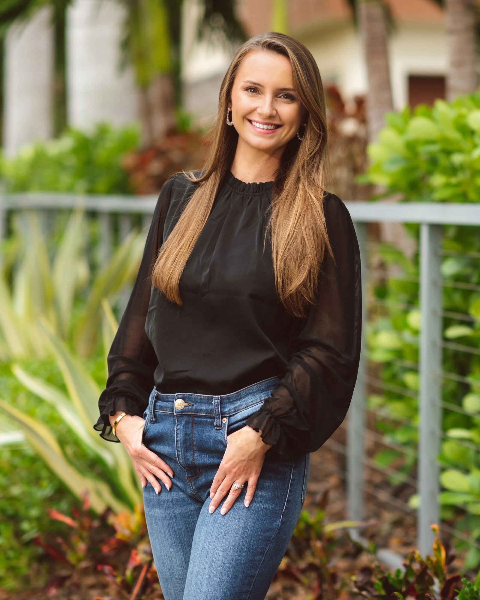Dr. Nicole Biondoletti smiling outdoors in Tampa Bay, Florida