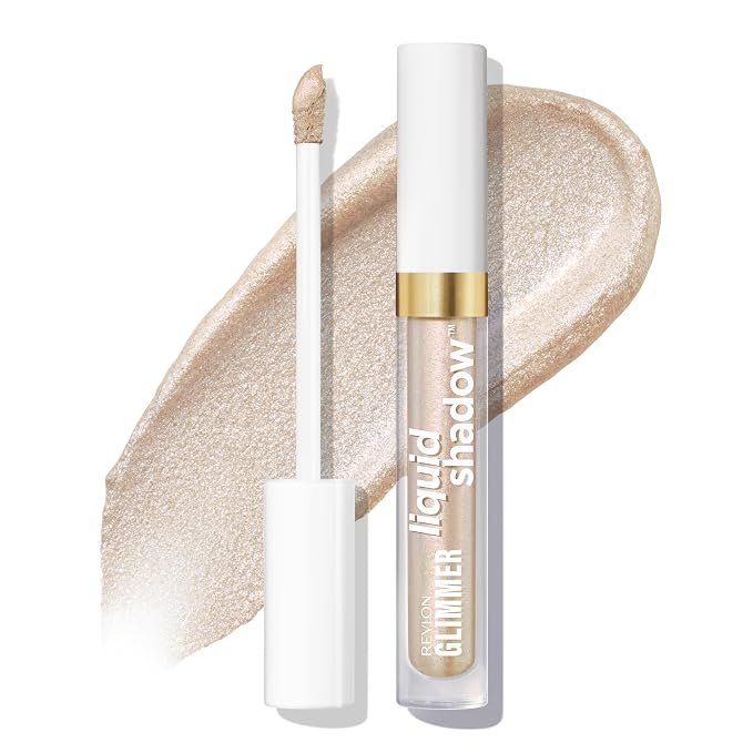 Liquid shadow in a clear tube with white and gold cap, surrounded by a beige cream swatch.
