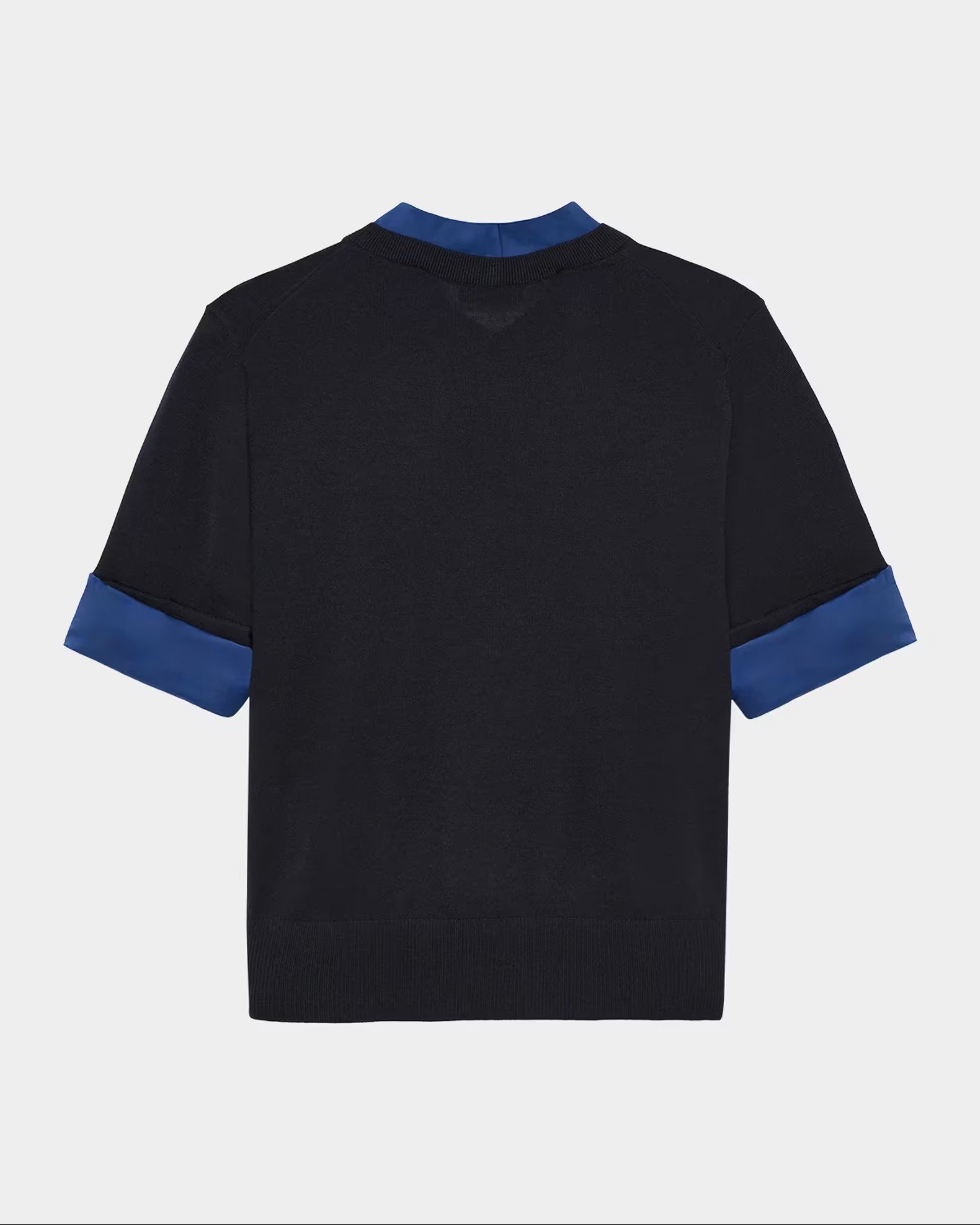 Back view of a black sweater with blue inner sleeves and collar.