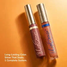 Two tubes of long-lasting liquid lipstick with metallic caps, one in pink and the other in purple, on a yellow-orange background.