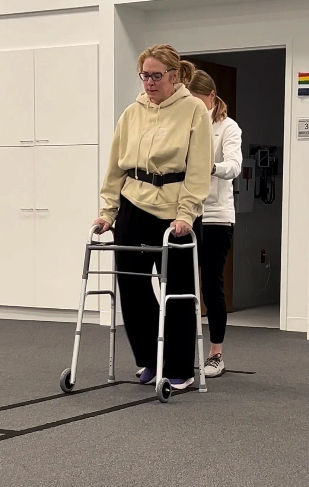 Jess Patz relearning to walk with walker after stroke recovery