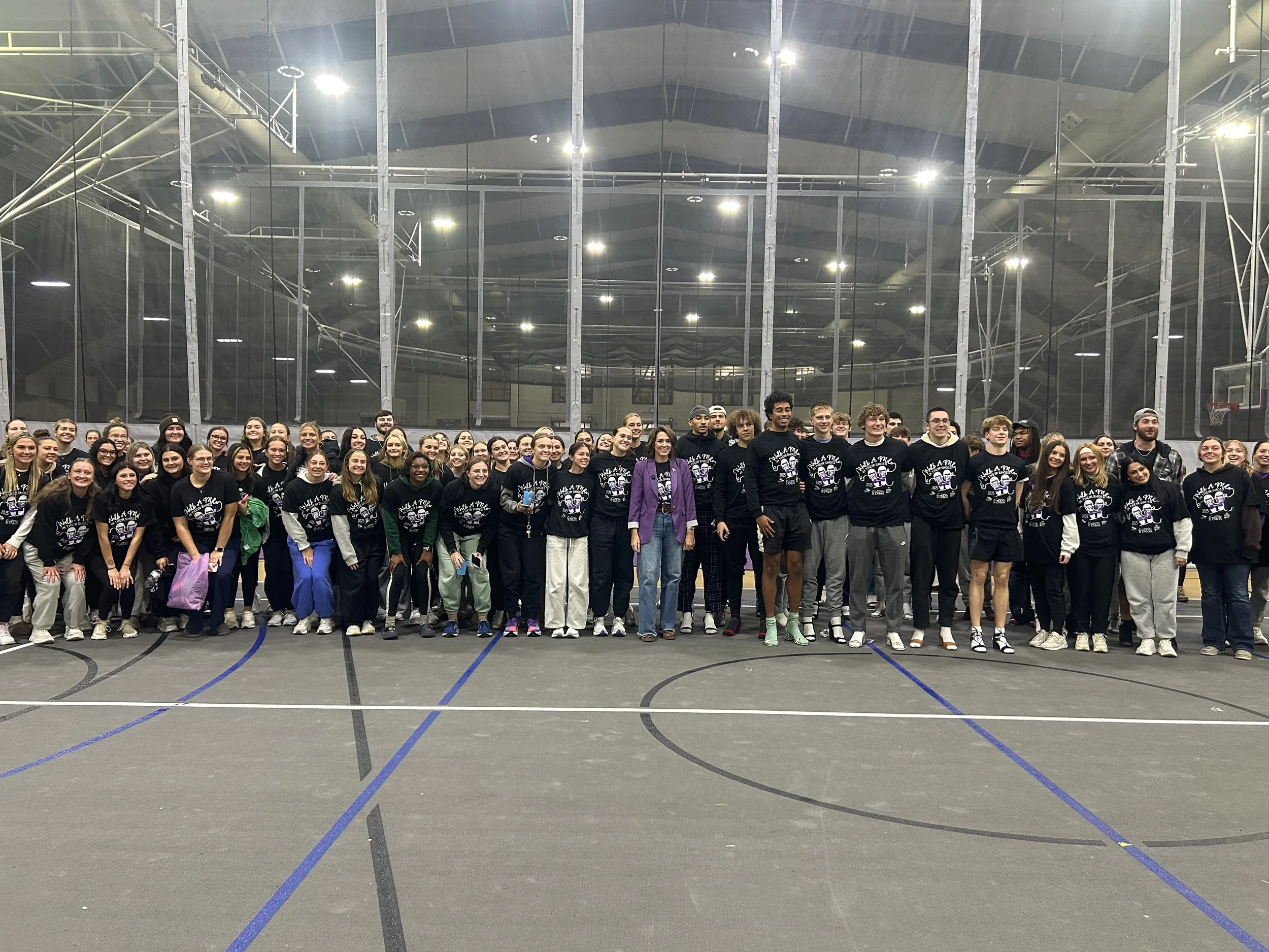 Jess Patz with students and attendees after speaking at Mount Union College.