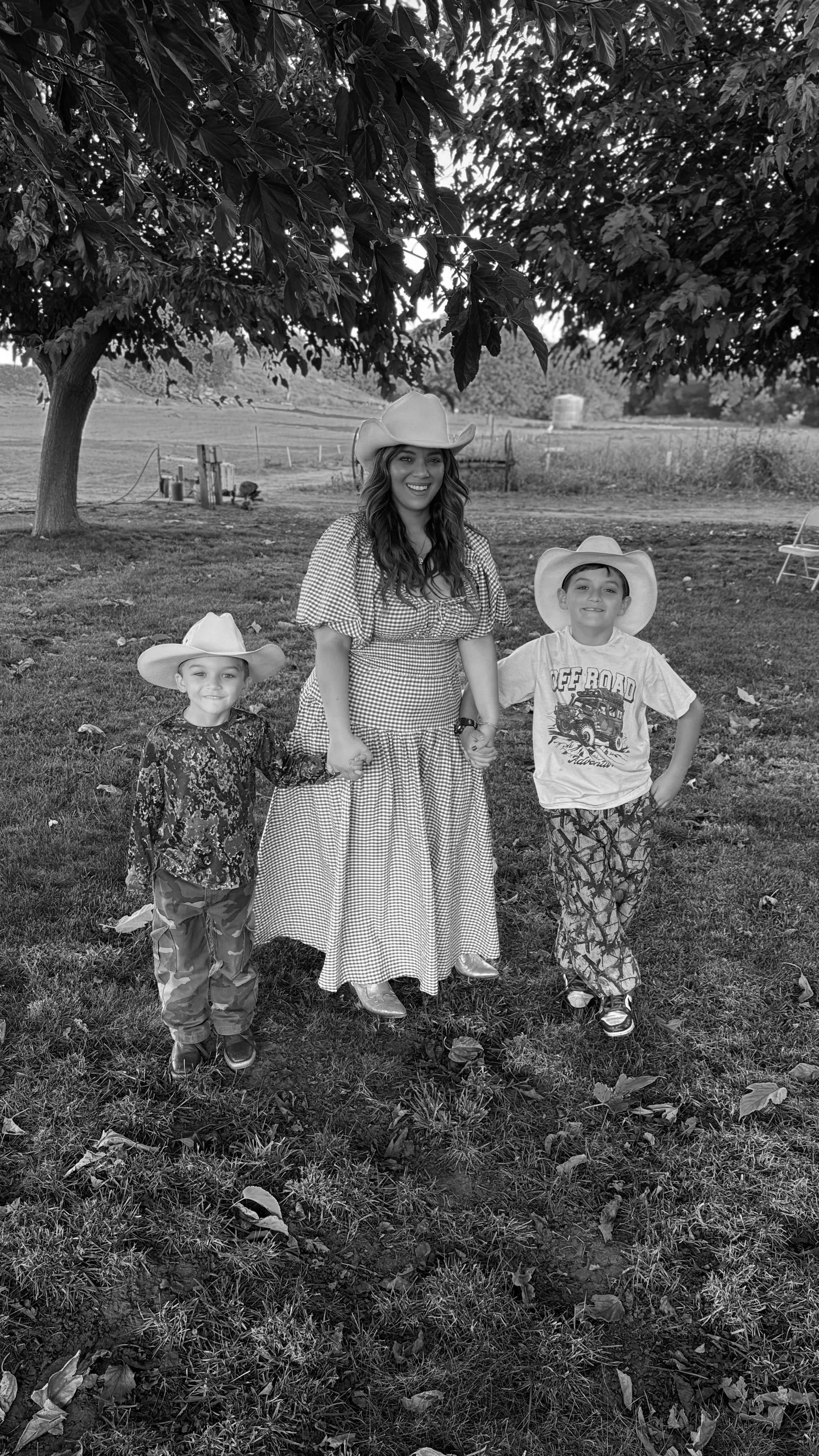 Alexsis with her boys on the family farm