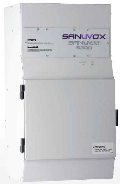 A white air purifier or filtration unit labeled 'SANUVOX SANUAIR S300' with caution and attention notices on the front