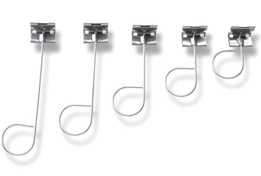 Five metal hooks with small attachments at the top, arranged in a row.