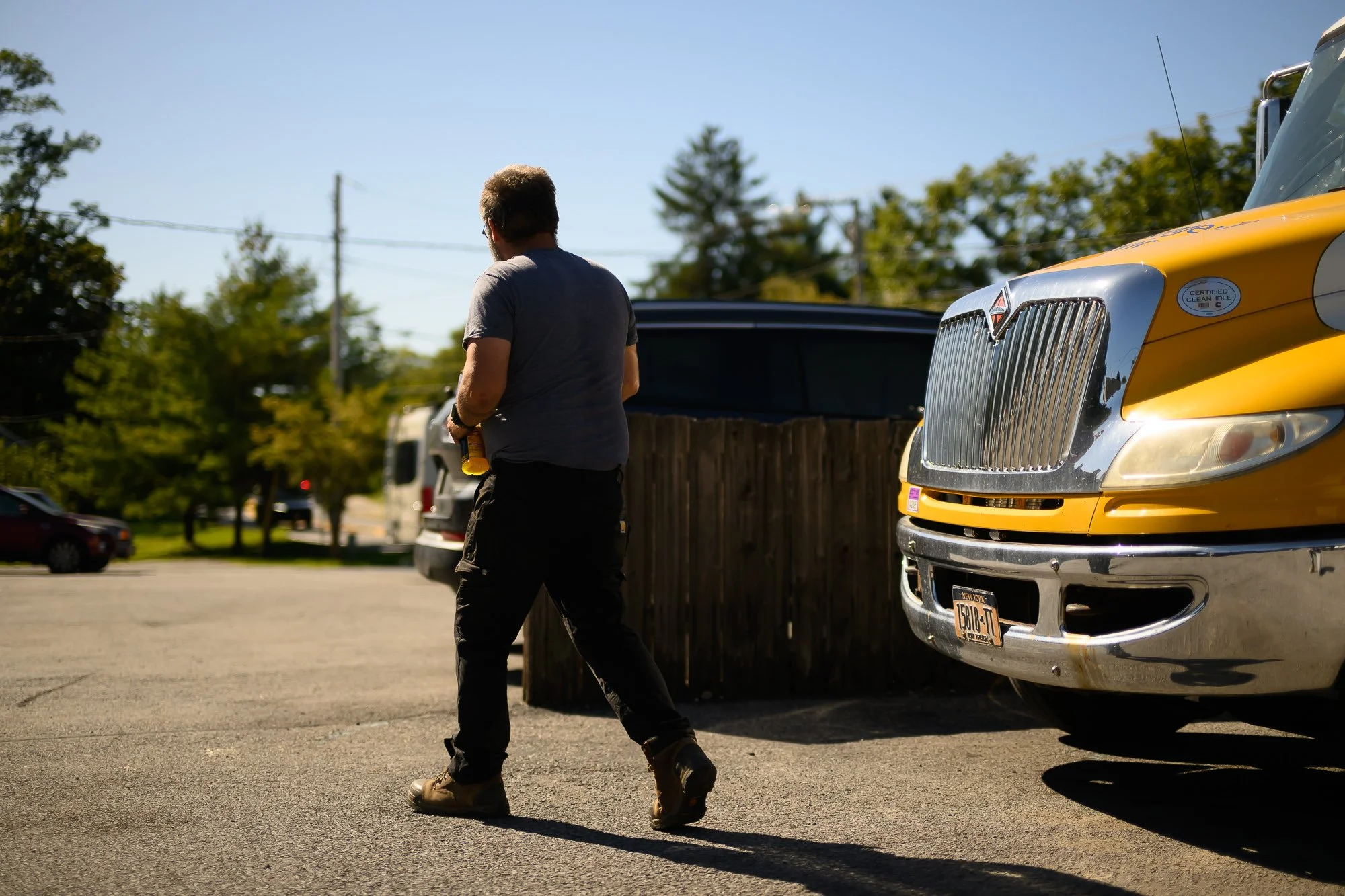 Delarm's Auto parking lot on East Market Street with a tow truck
