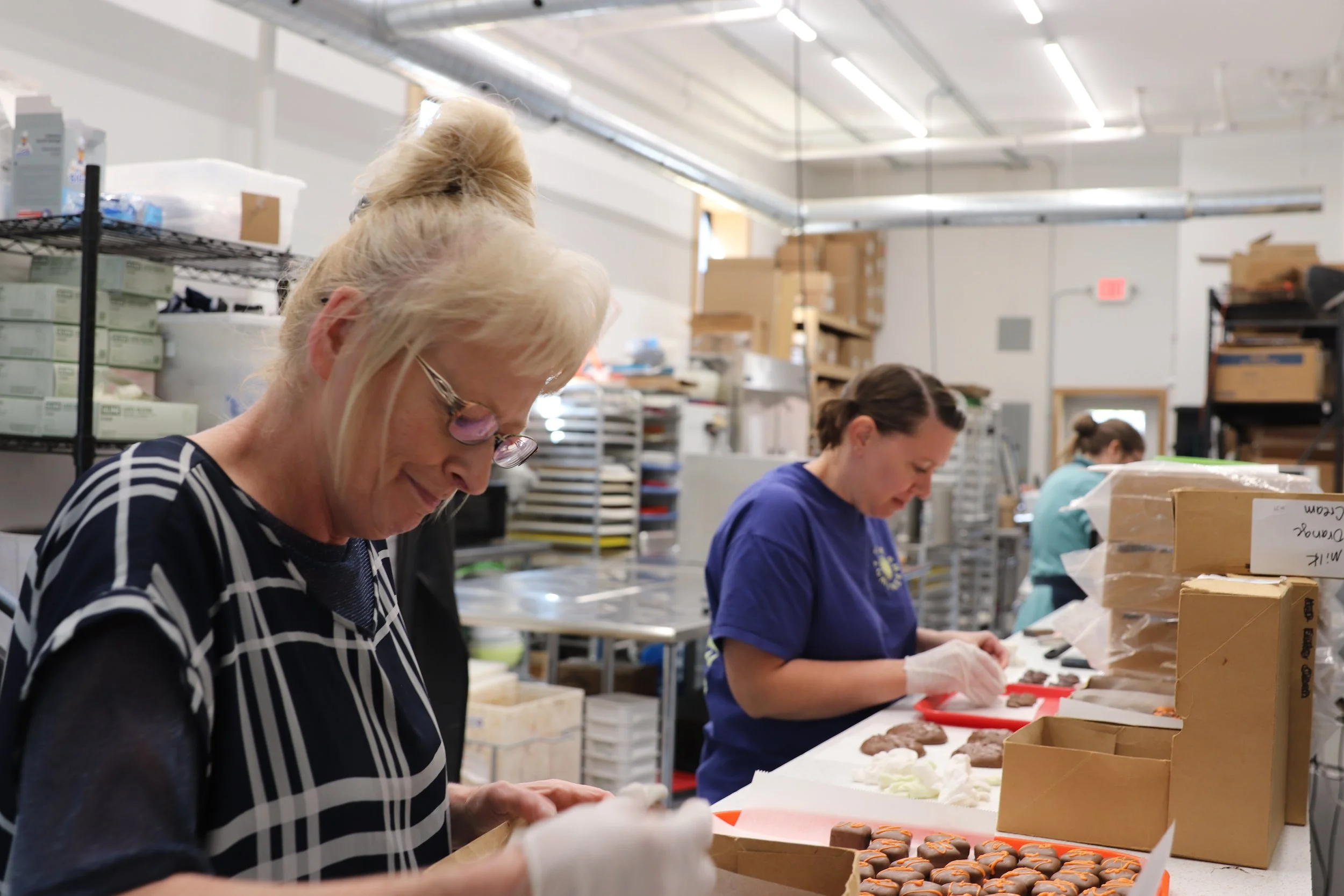 Employees working at a chocolate shop